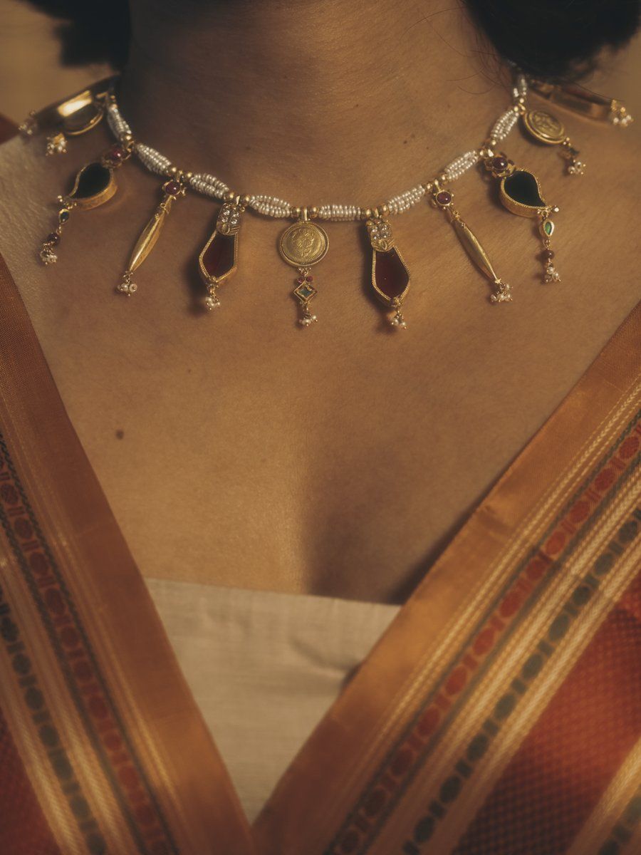 Heirloom gold and stone necklace, close detail