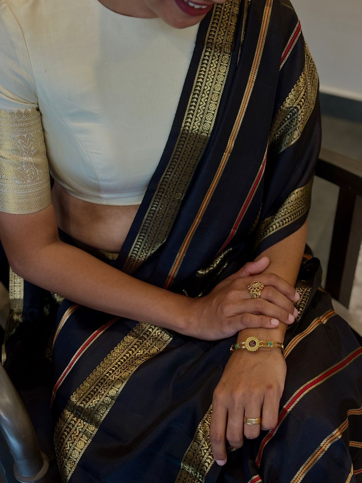 Kanjivaram border with stacked bangles and rings