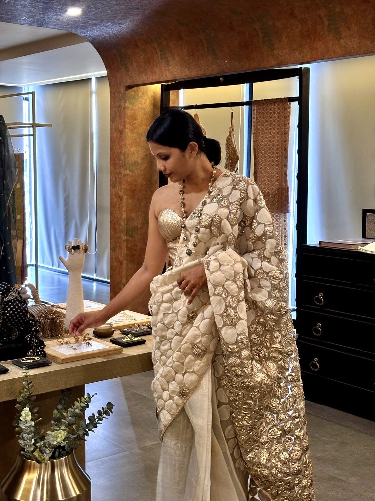 Textured ivory and silver saree drape